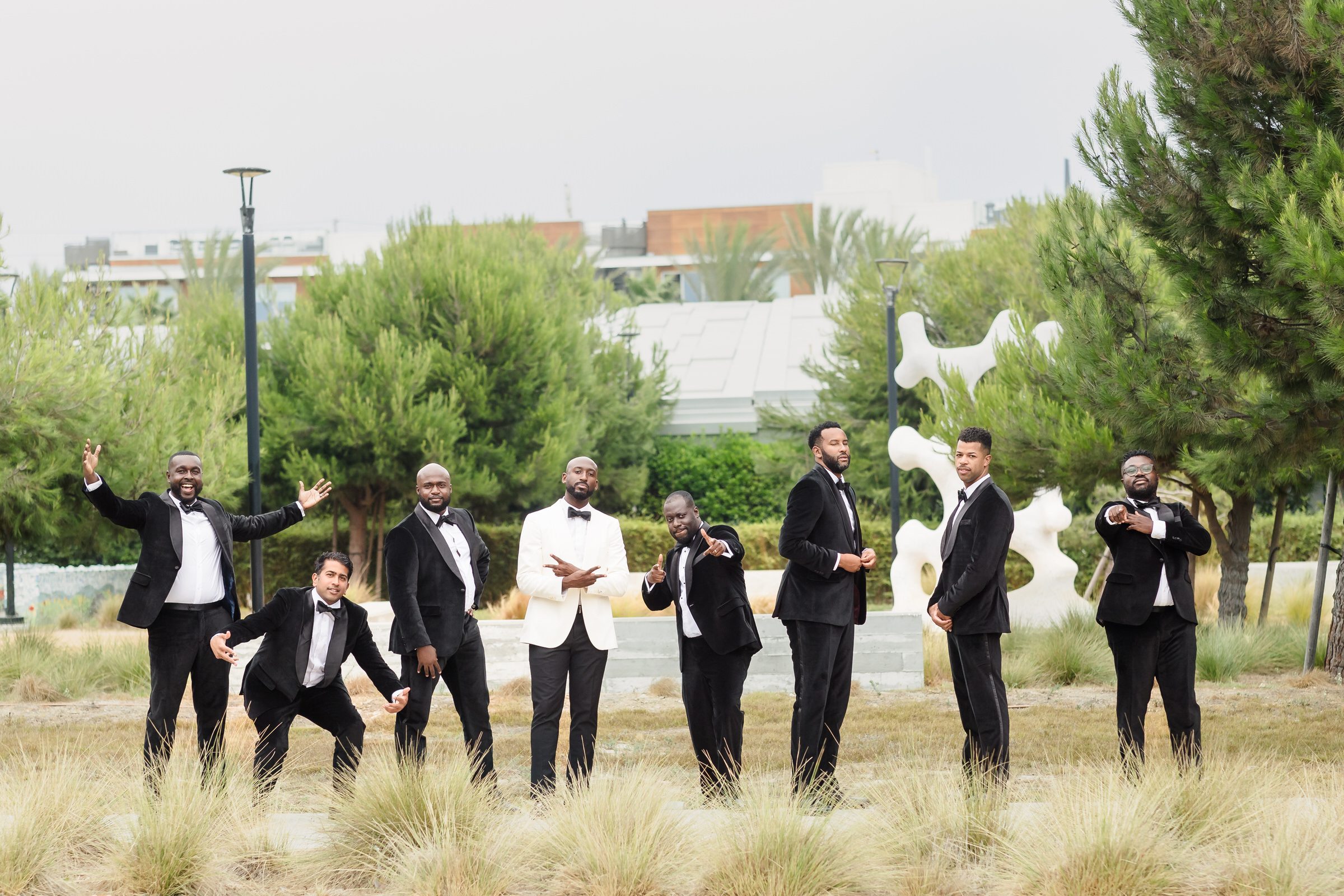 Sharp, stylish, and full of joy! This group of Black groomsmen celebrates brotherhood and happiness, capturing timeless moments of friendship and wedding day energy. #GroomsmenGoals #BlackExcellence #WeddingPhotography #Brotherhood #DapperStyle #TimelessMoments